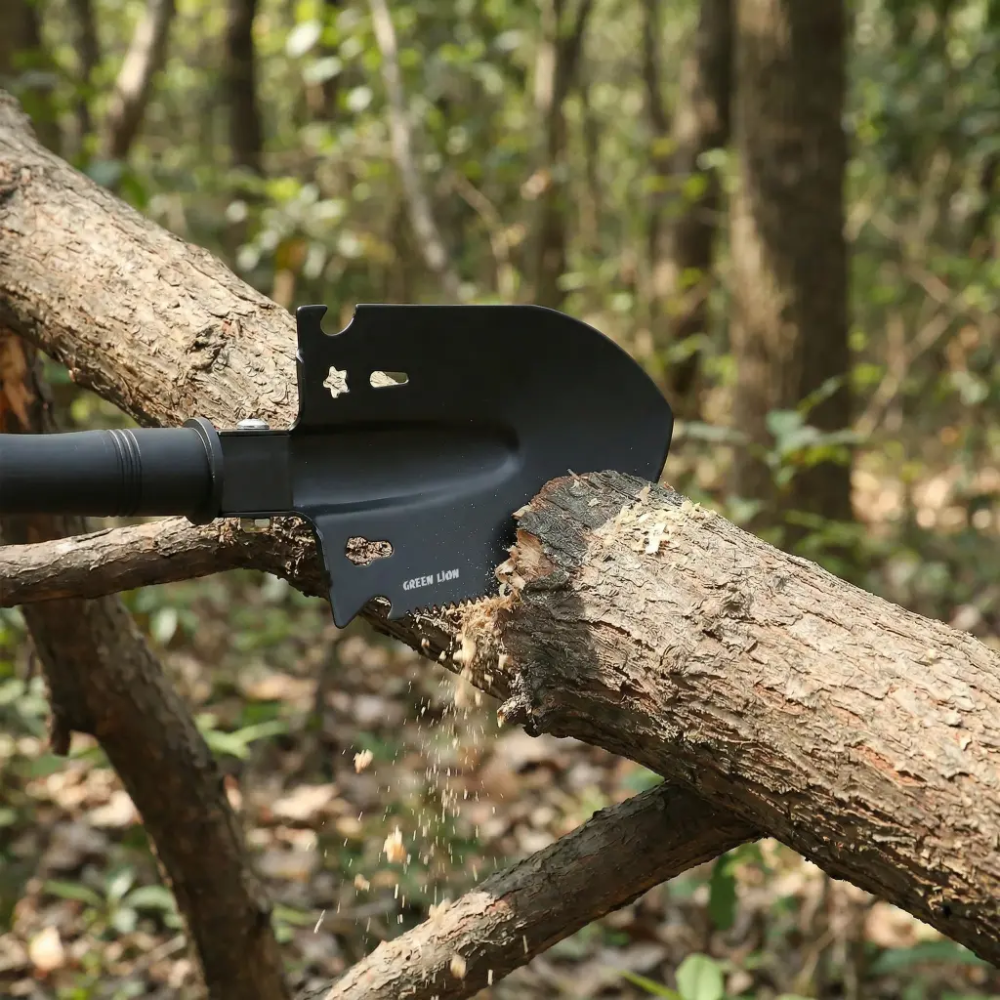 Green Lion mini shovel cutting tree branch with steel head and saw edge