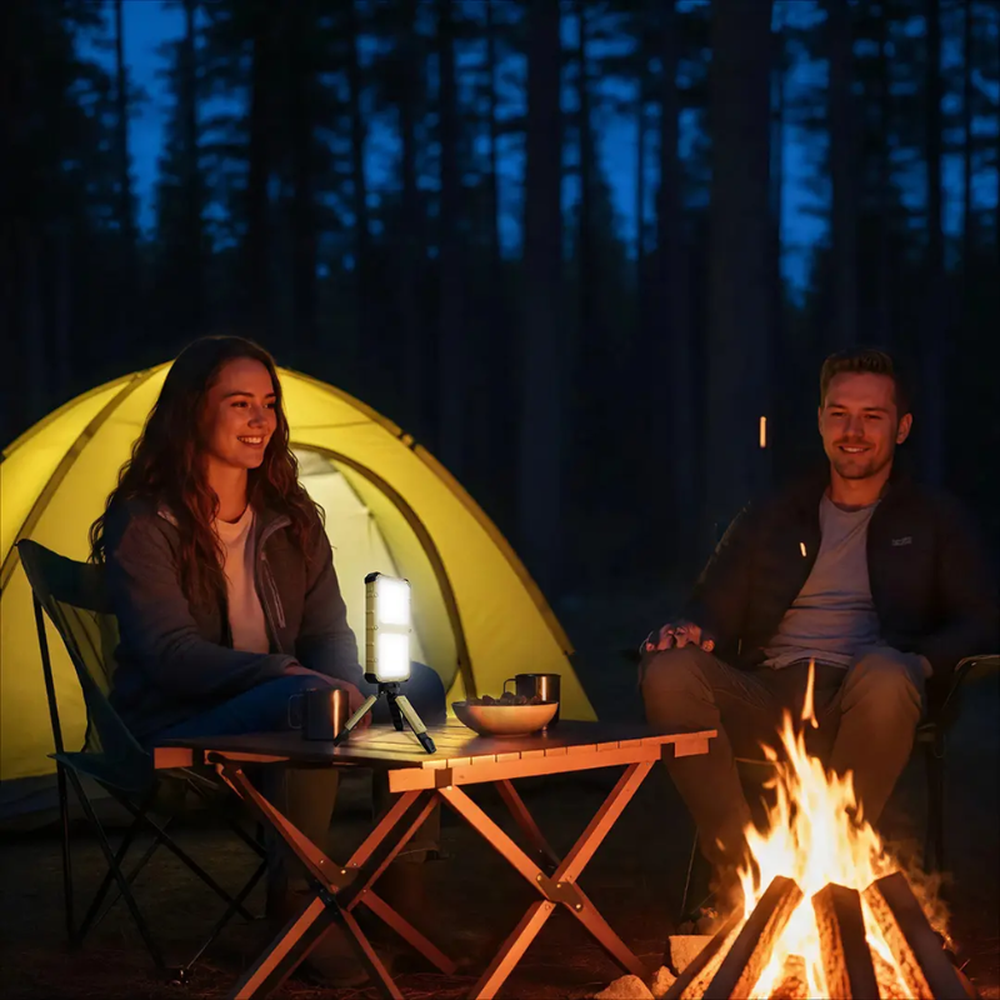 Solar power bank with 1200lm LED light illuminating campsite at night