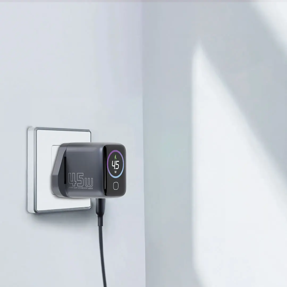 Powerology 45W GaN wall charger plugged in displaying 45W output