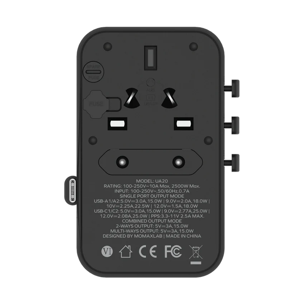 Back view of Momax UA20 travel adapter showing fuse compartment and toggle switches