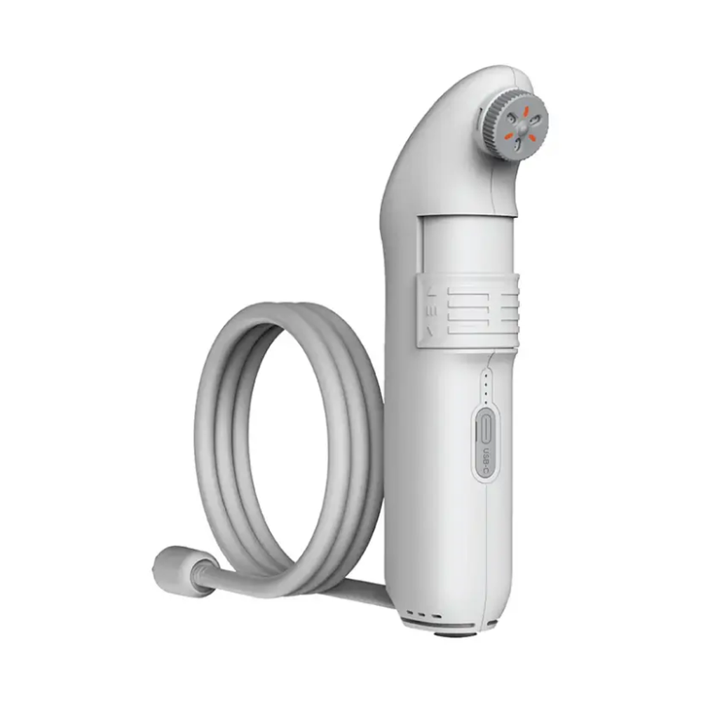 White Green Lion portable bidet with coiled hose and USB-C charging port