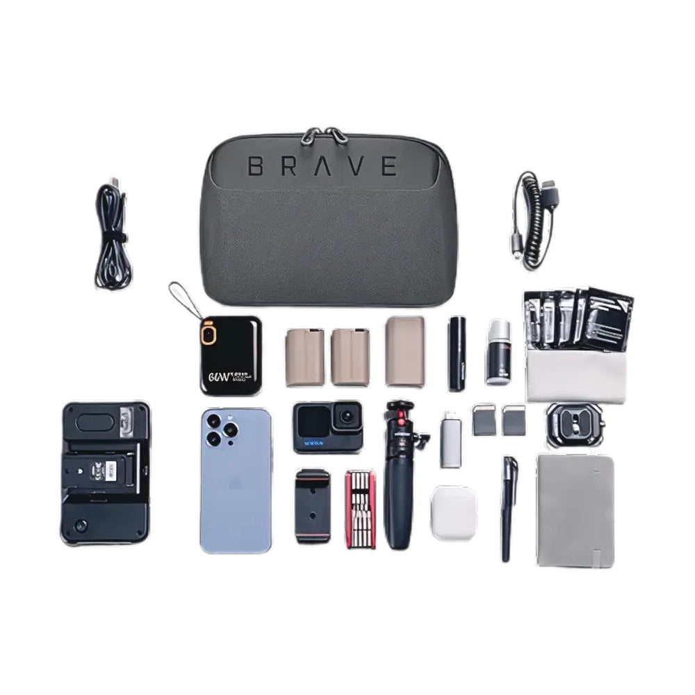 Gray Brave tech pouch flat lay with smartphone camera and accessories