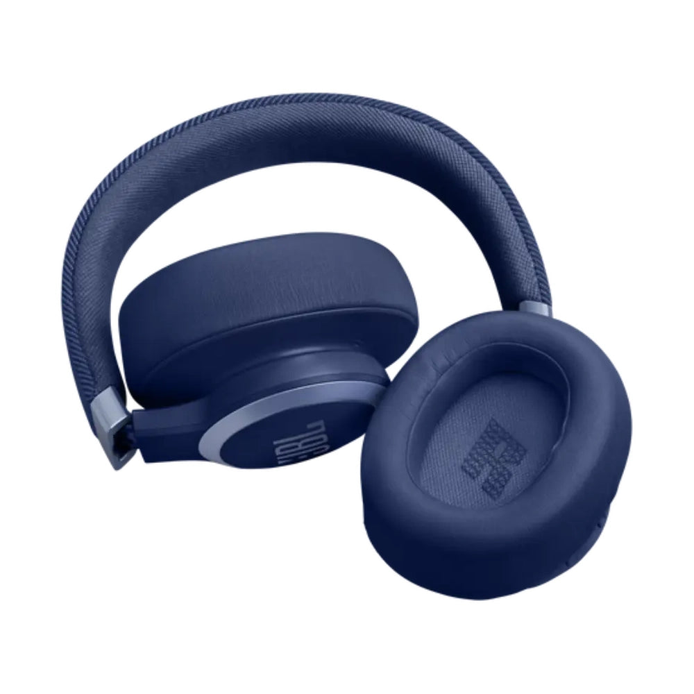 Blue JBL over-ear headphones angled to show inner earpad text and adaptive noise cancelling