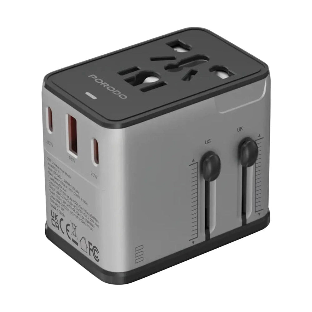 Travel adapter with multiple plug sockets on a white background