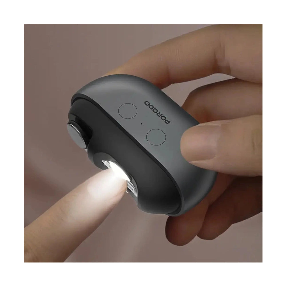 Porodo electric nail clipper demonstrating built-in LED light for precise trimming
