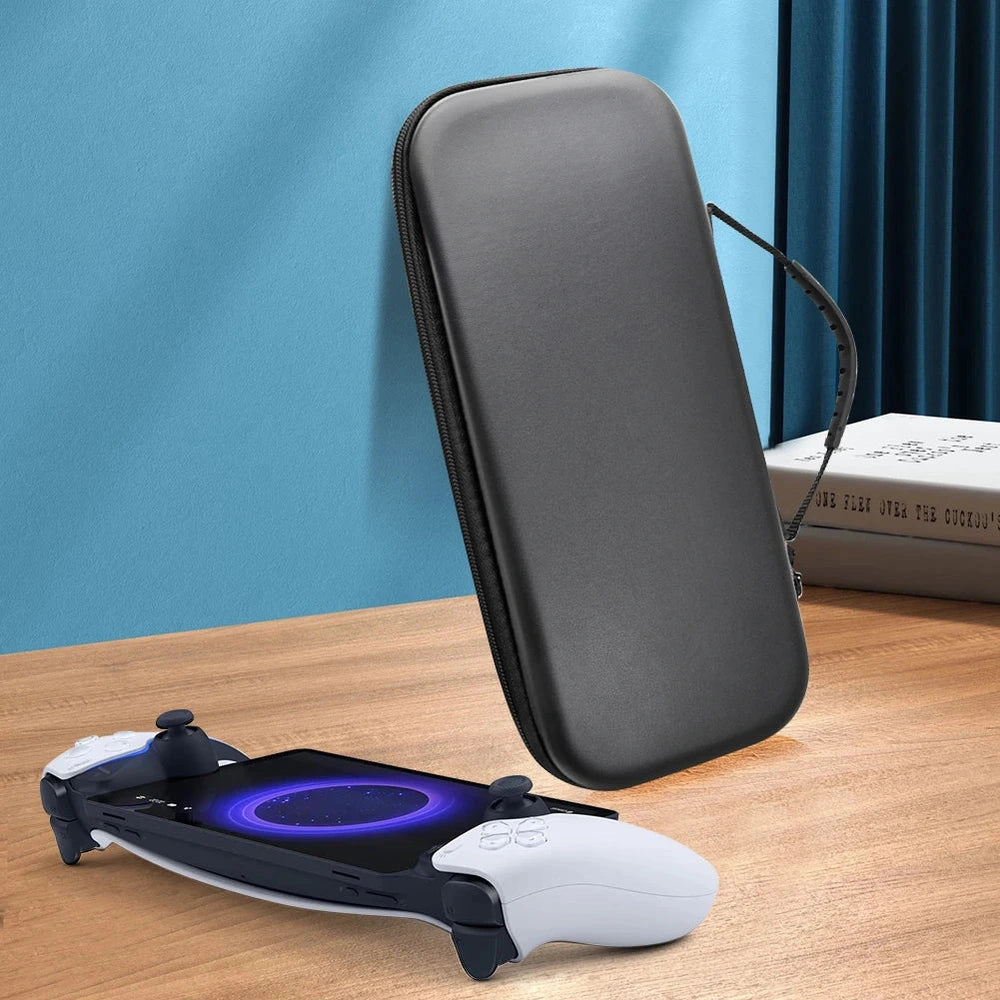 Upright black PS Portal protective case next to device with glowing screen