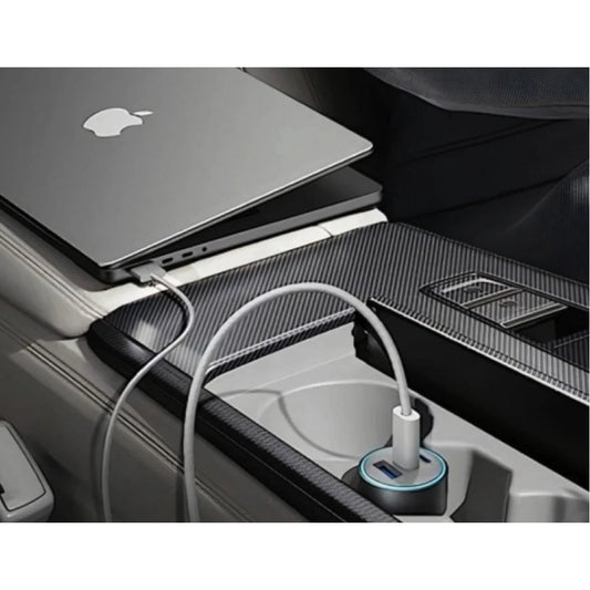 Anker car charger charging laptop in cup holder with blue LED ring