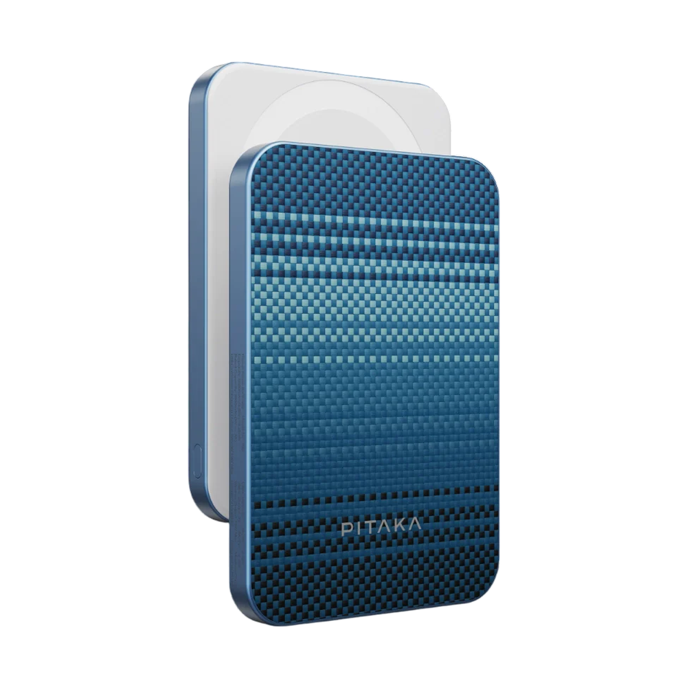 Pitaka 5000mAh magnetic power bank with blue gradient woven fiber pattern and white wireless charging surface.