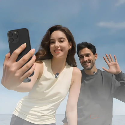 Man and woman wearing Porodo clip-on wireless microphones for outdoor recording