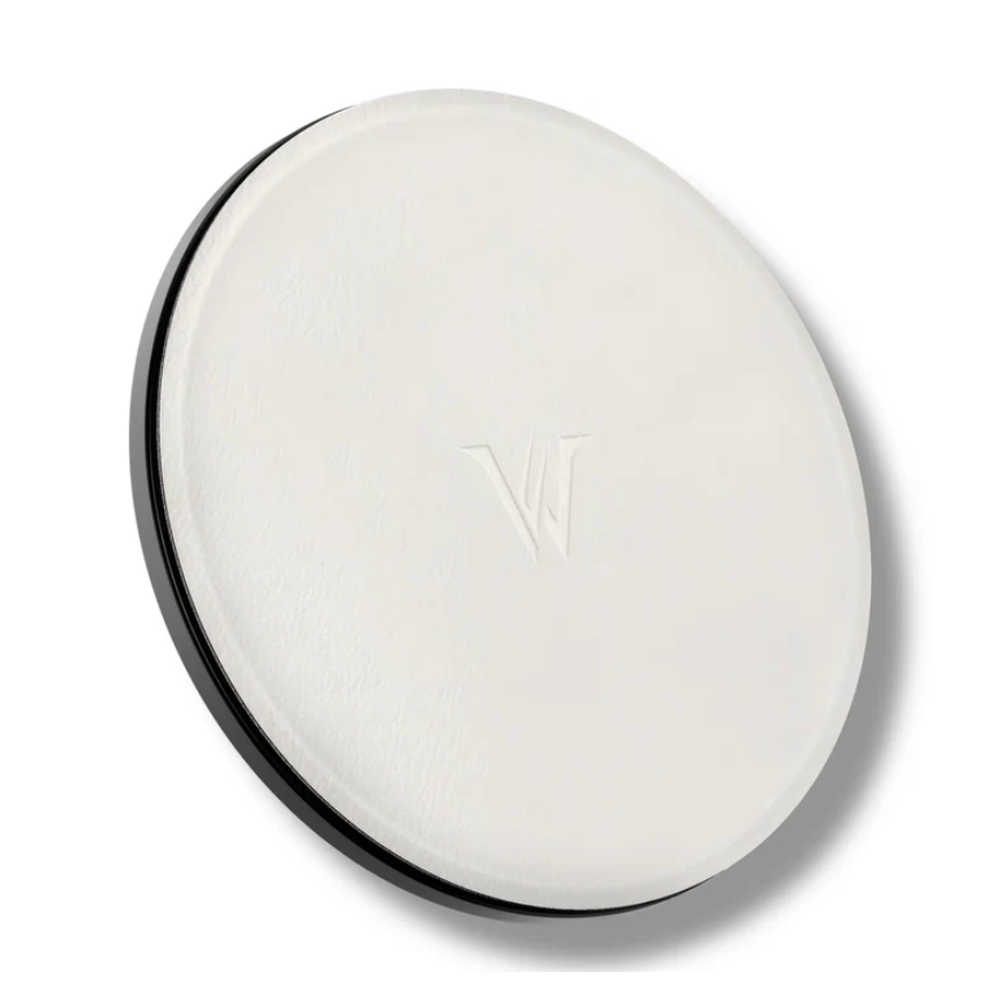 White circular magnetic phone grip with textured surface and W logo