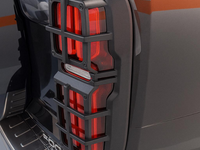 Installed matte black tail light trim on Tank 500 rear showing grid pattern fit