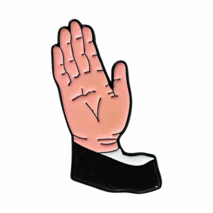 Pink hand enamel pin with black sleeve cuff and glossy finish