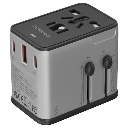 Travel adapter with multiple plug sockets on a white background