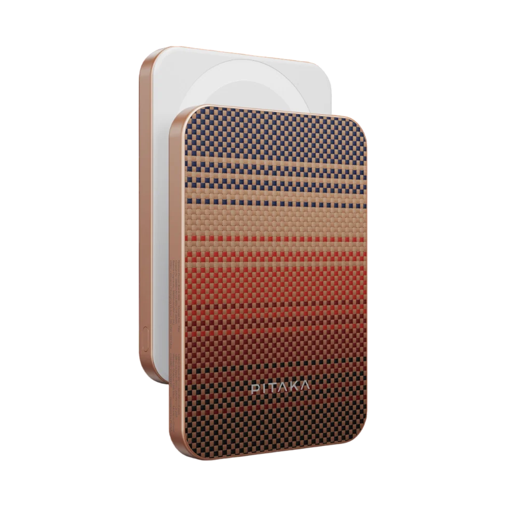 Pitaka 5000mAh magnetic power bank with woven-style multi-color pattern, rose gold trim, and white charging surface.